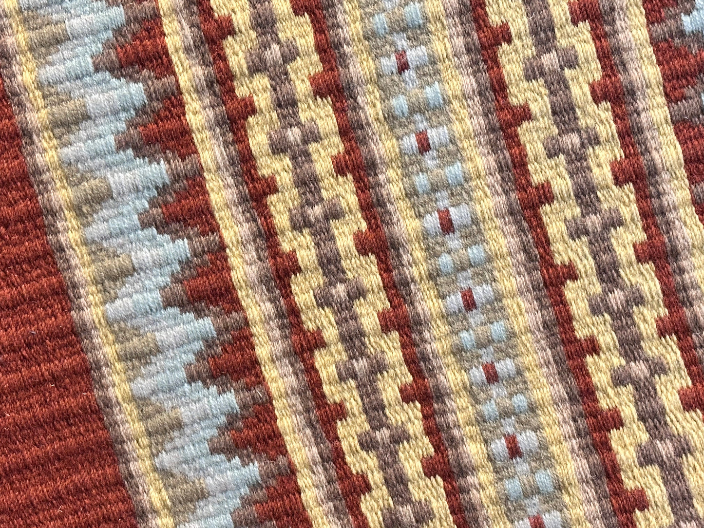 611. Oversized saddle blanket rust indian tan sheep skin sand gold