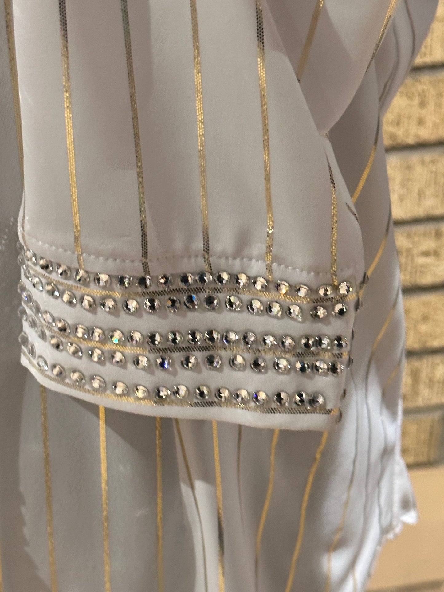 Size medium White vest set  with silver and gold design