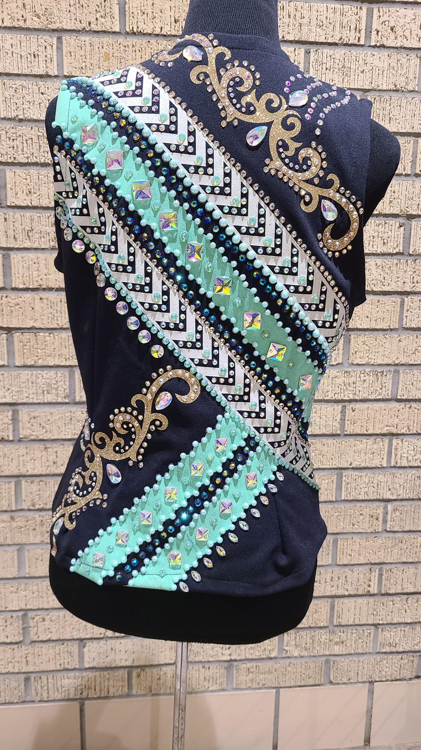 Size small black with mint white and gold design
