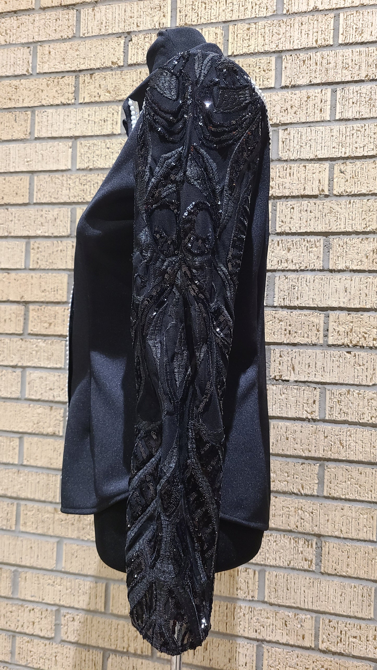 Size medium black stretch taffeta with silver and white design