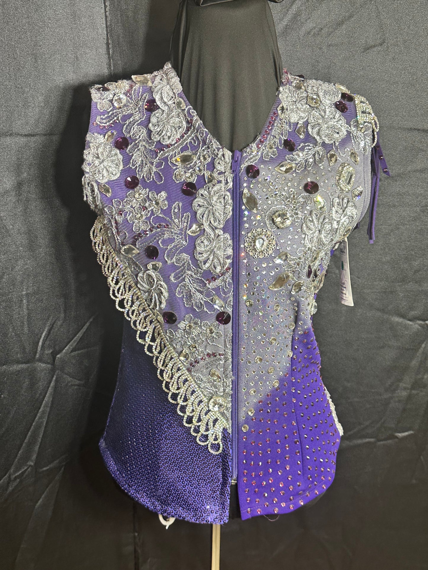 Size small purple vest with airbrushed design.