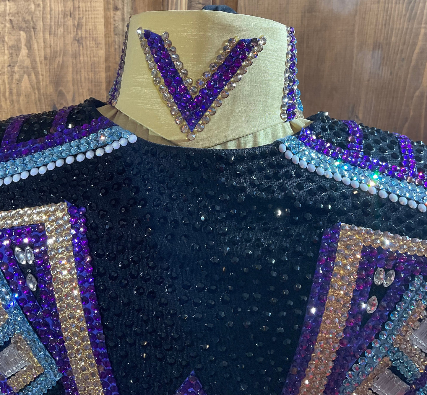 Size large black vest with matching gold stretch taffeta shirt. Purple, aqua and gold accents.