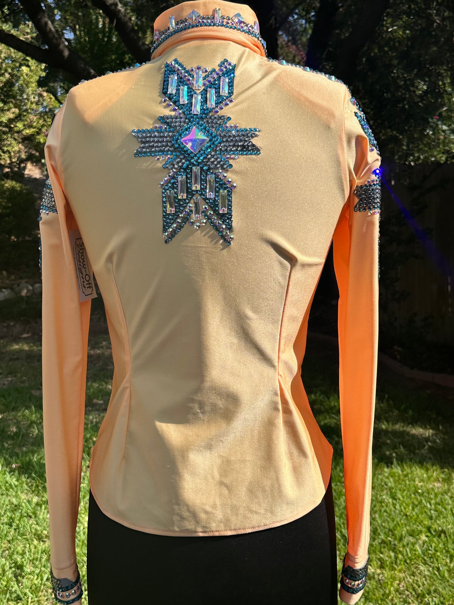 Size small bright peach and teal design