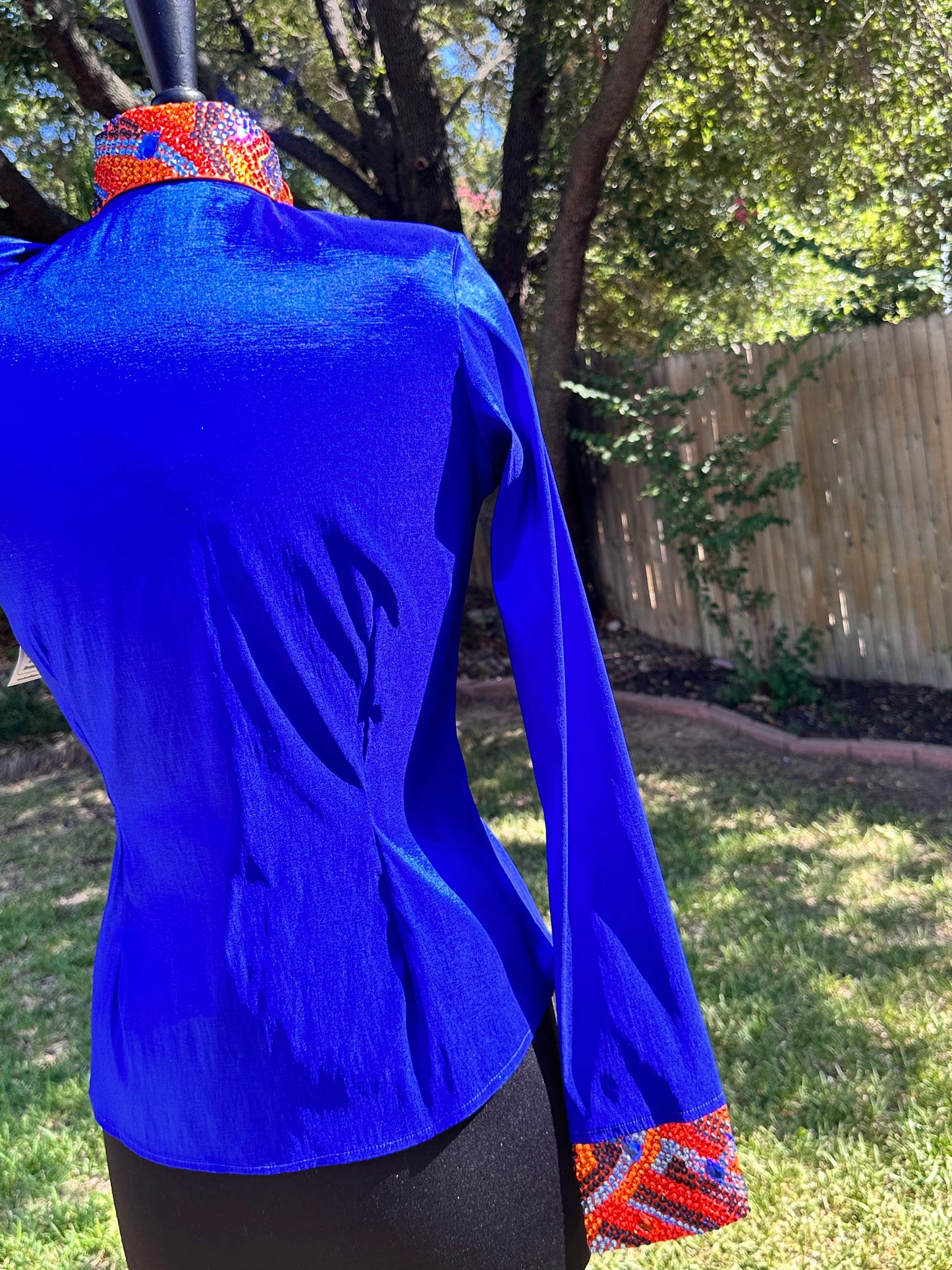 Size small day shirt Royal blue and orange. Hidden zipper.