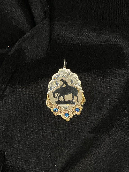 Silver By Wanda #8B  P36TB Trail horse pendant with gold floral design and blue cz stone