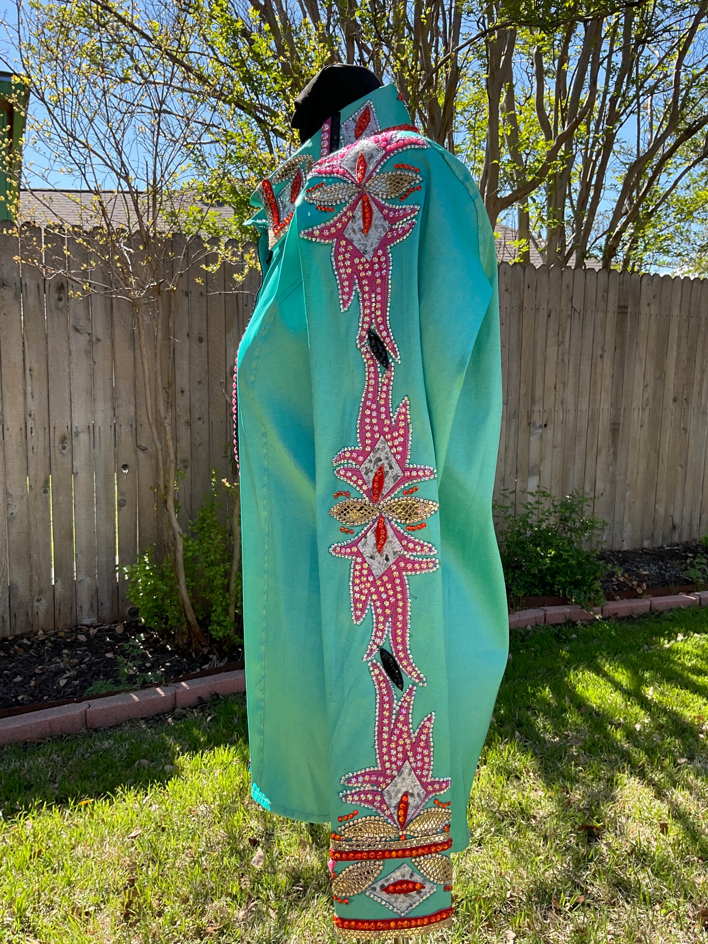 Size medium Teal stretch taffeta with orange and pink accents.
