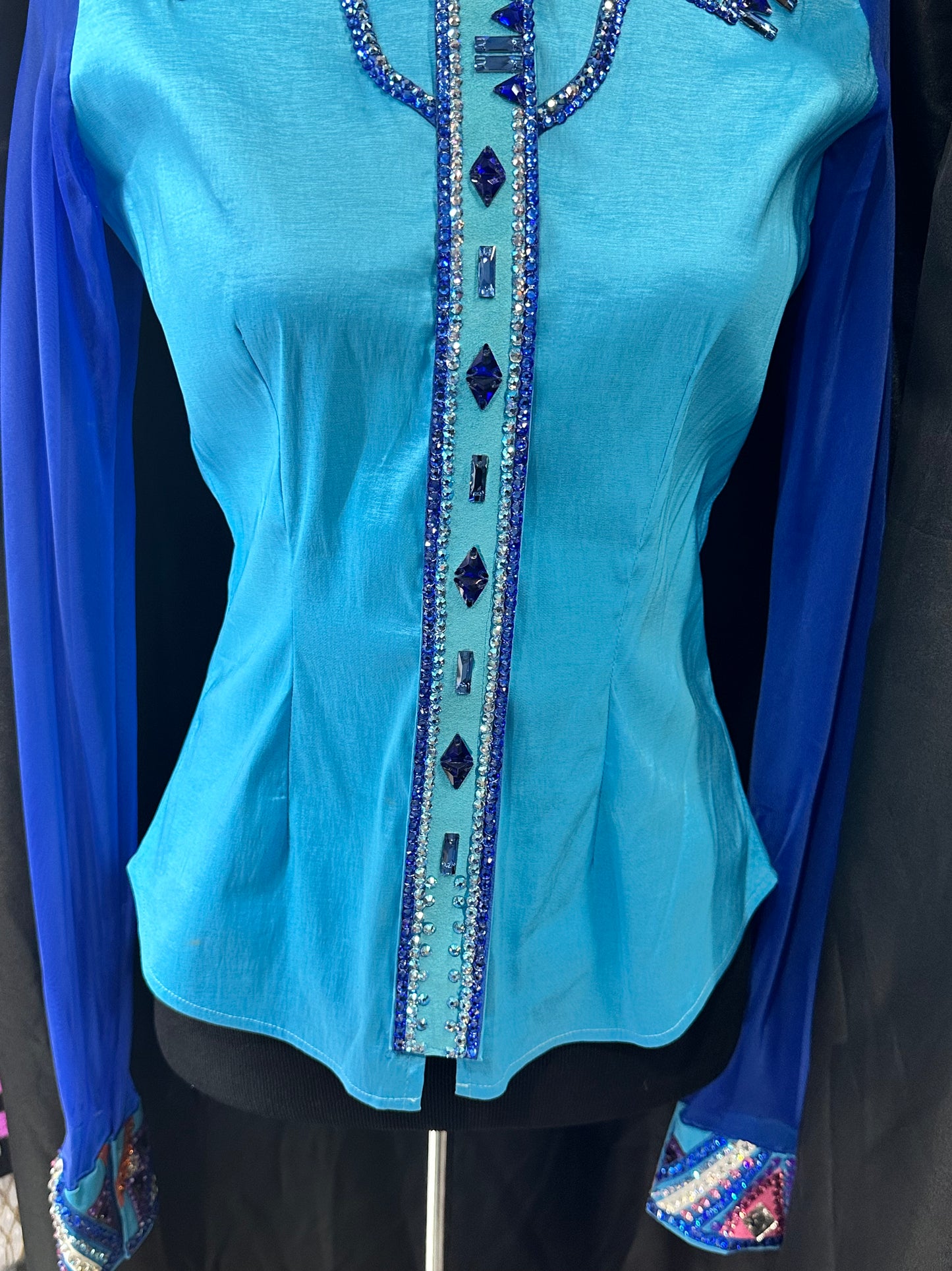 Size small day shirt soft turquoise stretch taffeta with sheer sleeves. Western yokes.