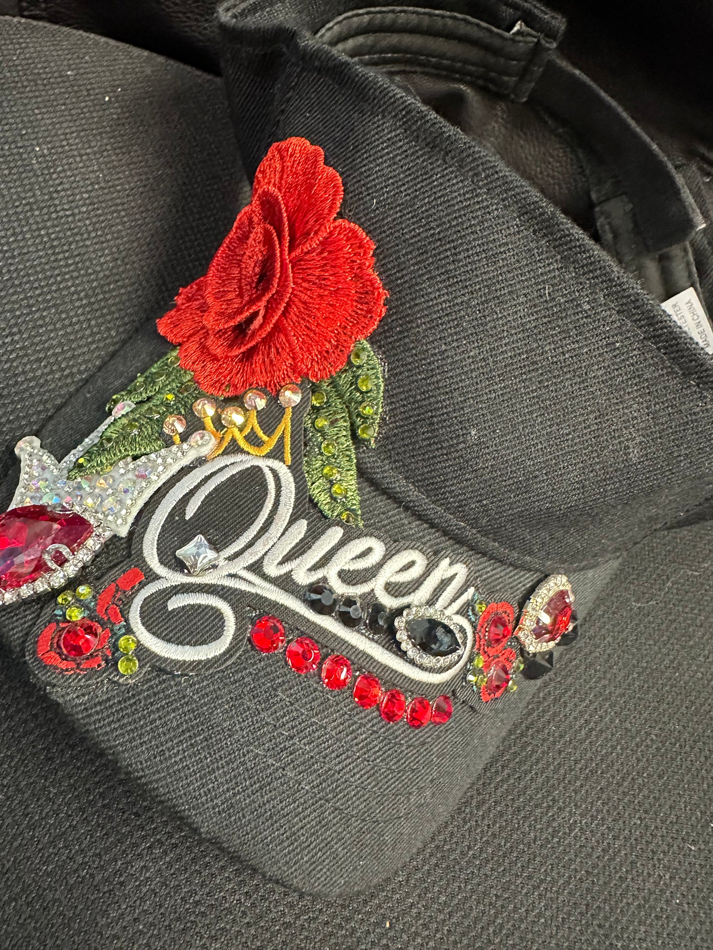 Fancy black and red Visor with one of a kind QUEEN design