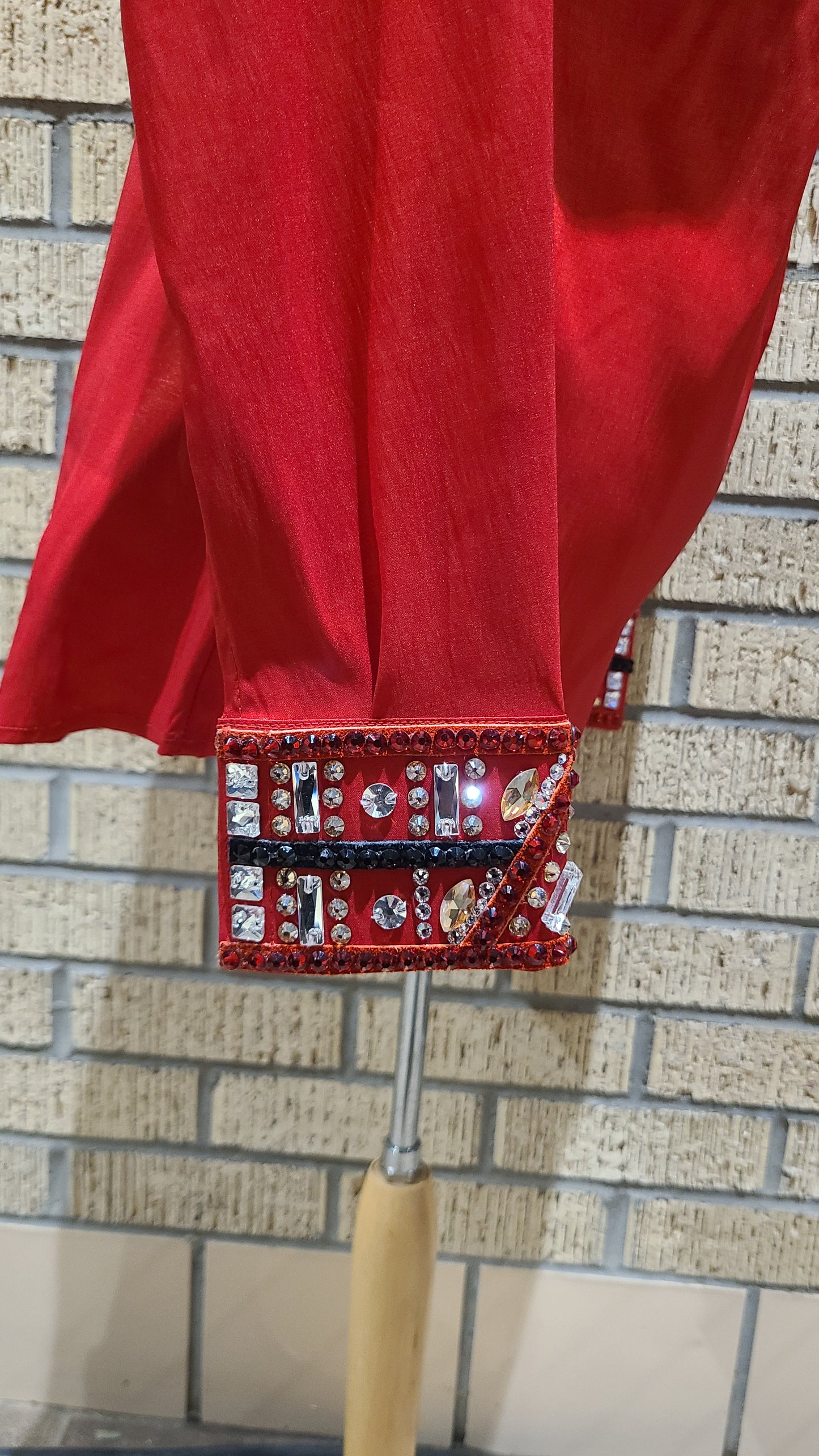 Size medium stretch red taffeta with silver, red and black accents