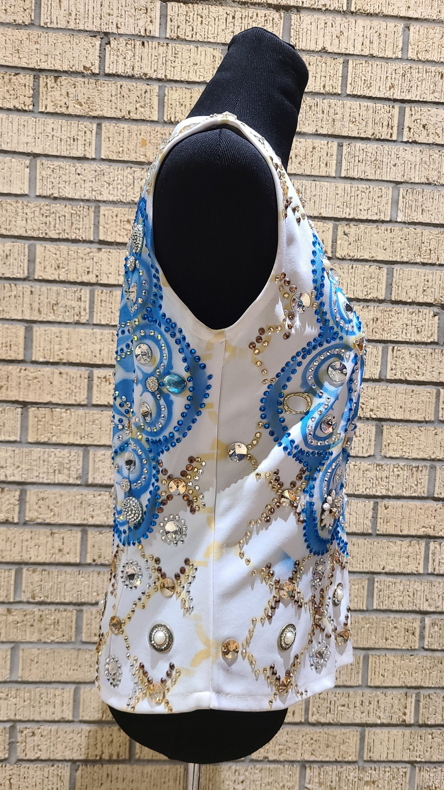 Size small white vest with blue and gold accents. Airbrushed design. STUNNING!