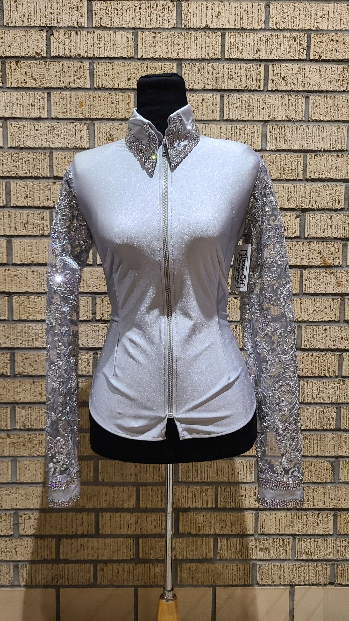 Size medium silver stretch with lace sleeves pale lavender accents