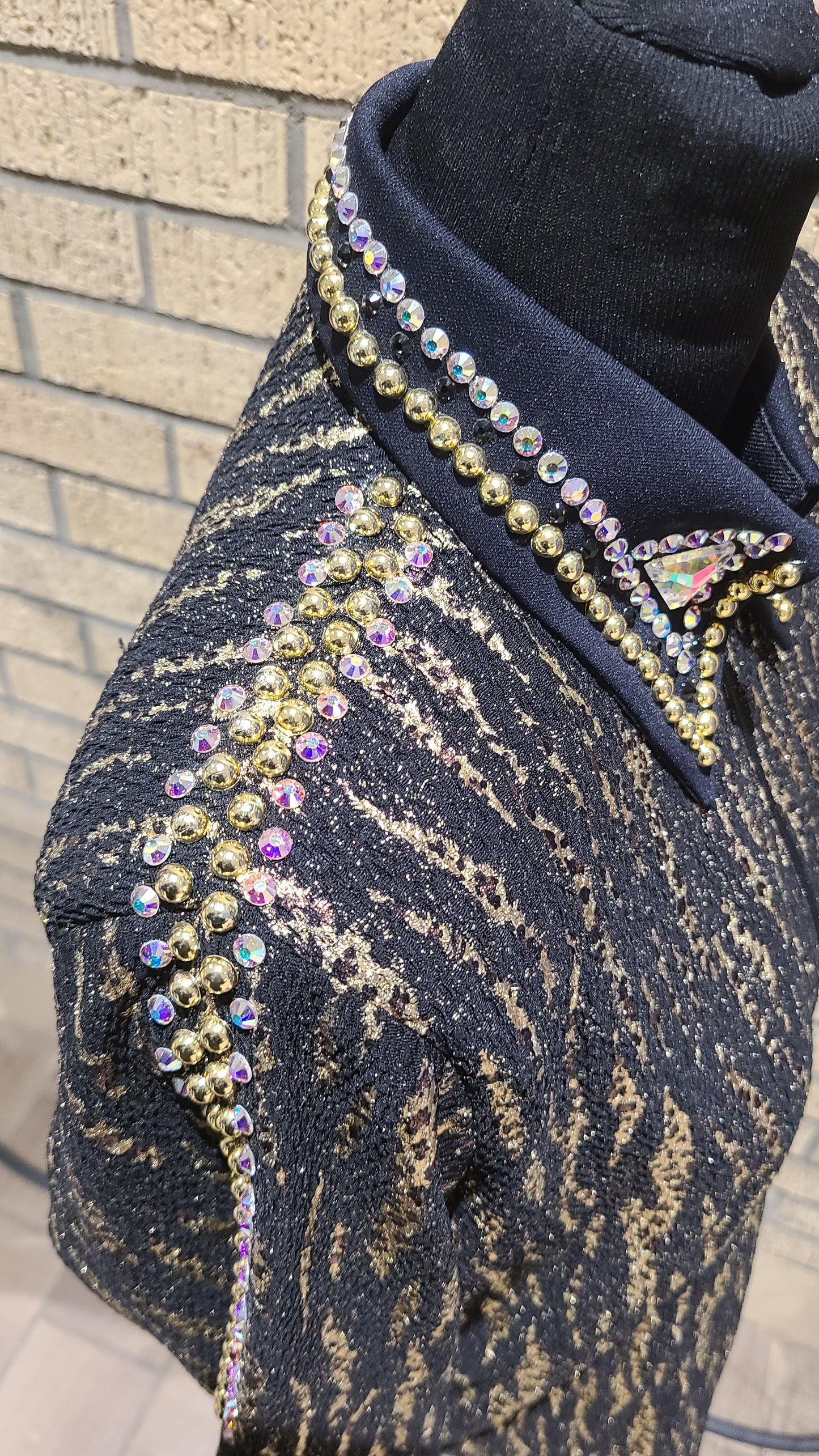 Size large black and gold shirt. AB crystals and gold pearls