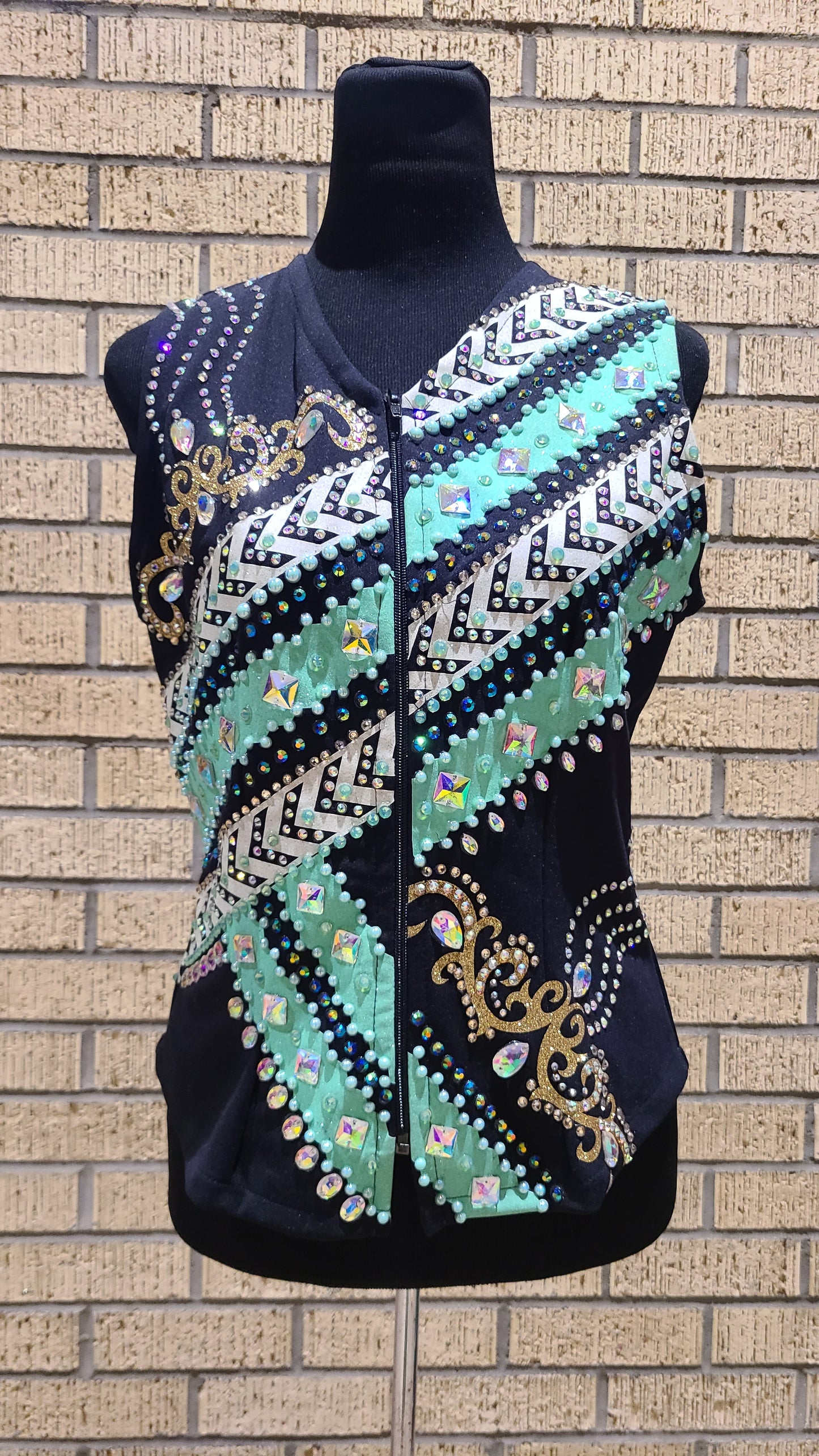 Size small black with mint white and gold design